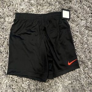 Nike Kids Black Shorts with Red Logo